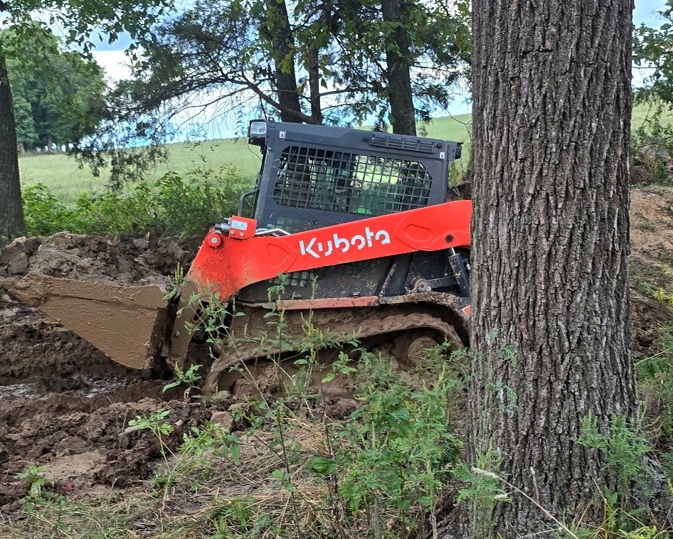 Tracked skid steer pictured in Taylor Excavation’s original company ad.